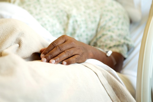 african american man in hospital bed