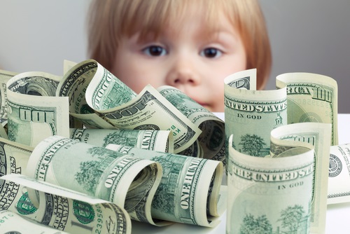 child-looking-at-money