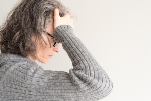 Mature woman with glasses