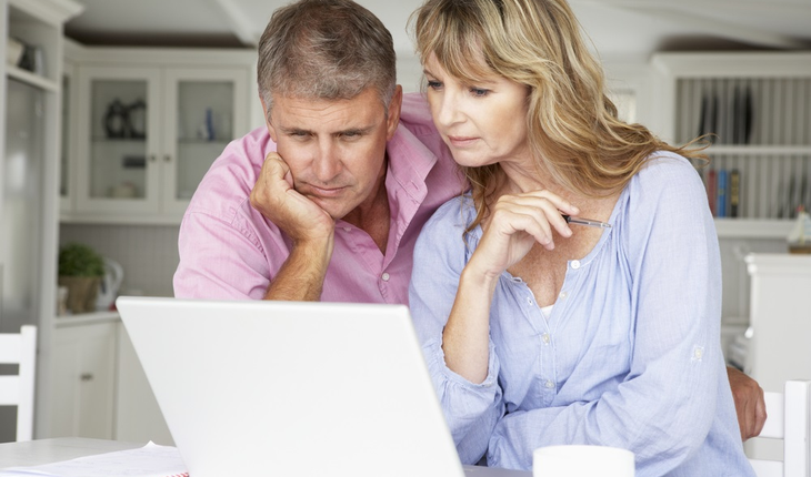 middle-aged-couple-with-laptop