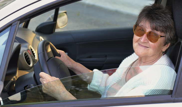 Senior woman at wheel of car