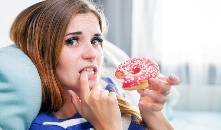 woman-eating-donut