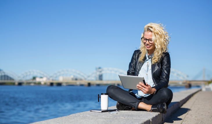young-woman-reading-tablet