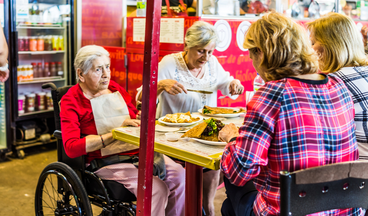 at a restaurant with a wheelchair