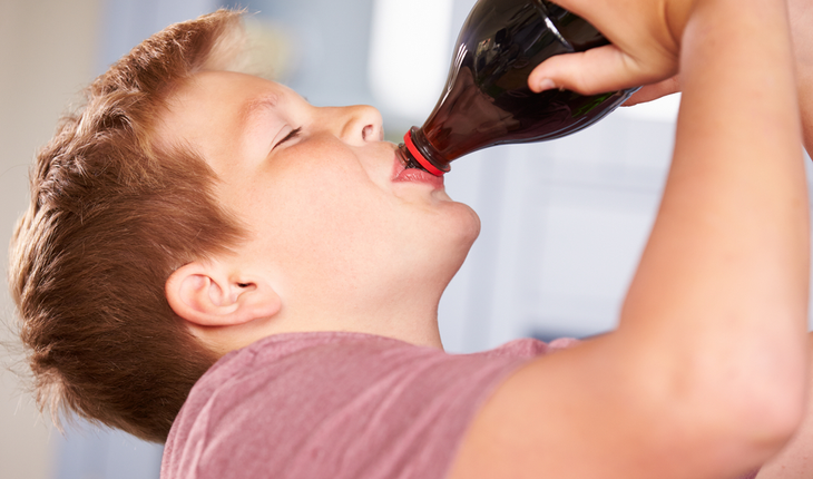 boy drinking soda