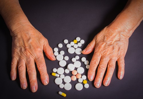 hands with pills