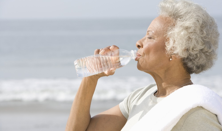 mature-African-American-woman-drinking-water