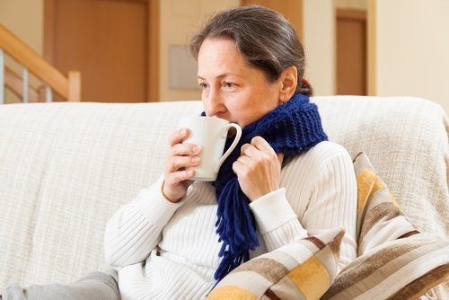 mature woman winter couch