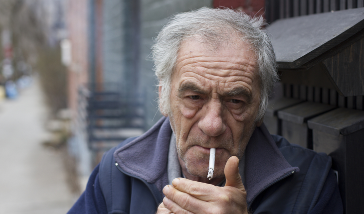 older man smoking