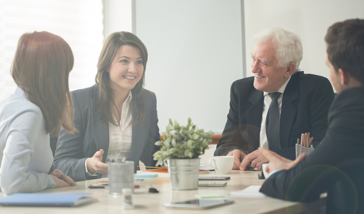 older-person-in-office-with-younger-people