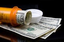 prescription-pill-bottle-and-money.jpg