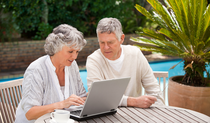 senior couple at computer
