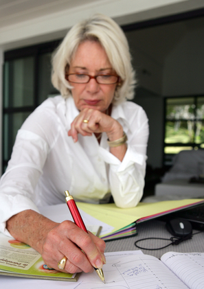 woman taking notes