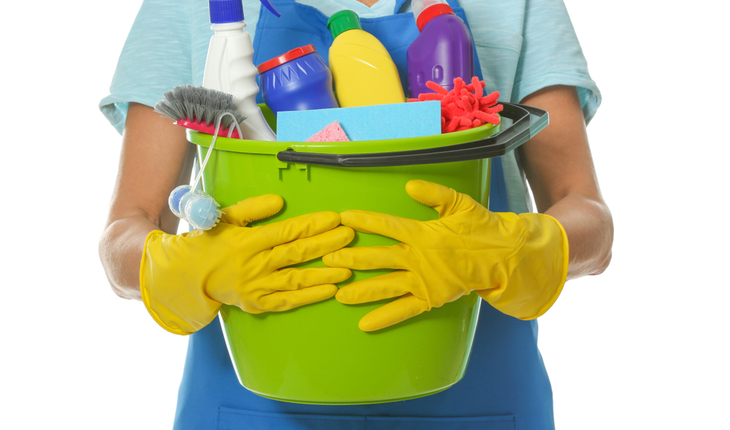 woman with cleaning supplies