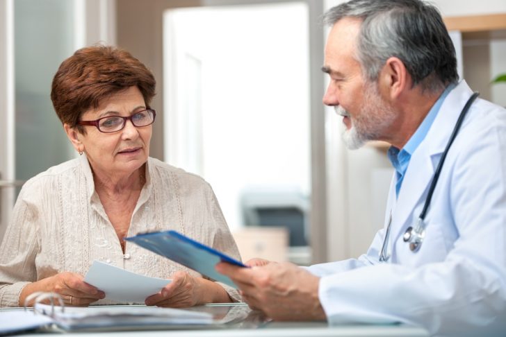 doctor, female patient, office