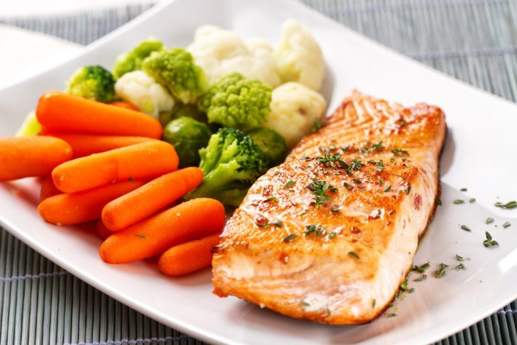 Fish and vegetables on plate