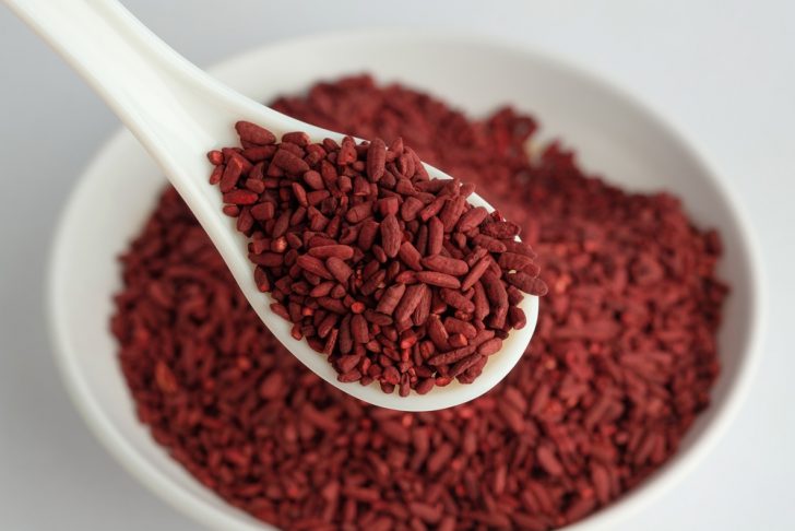 Red yeast rice on spoon