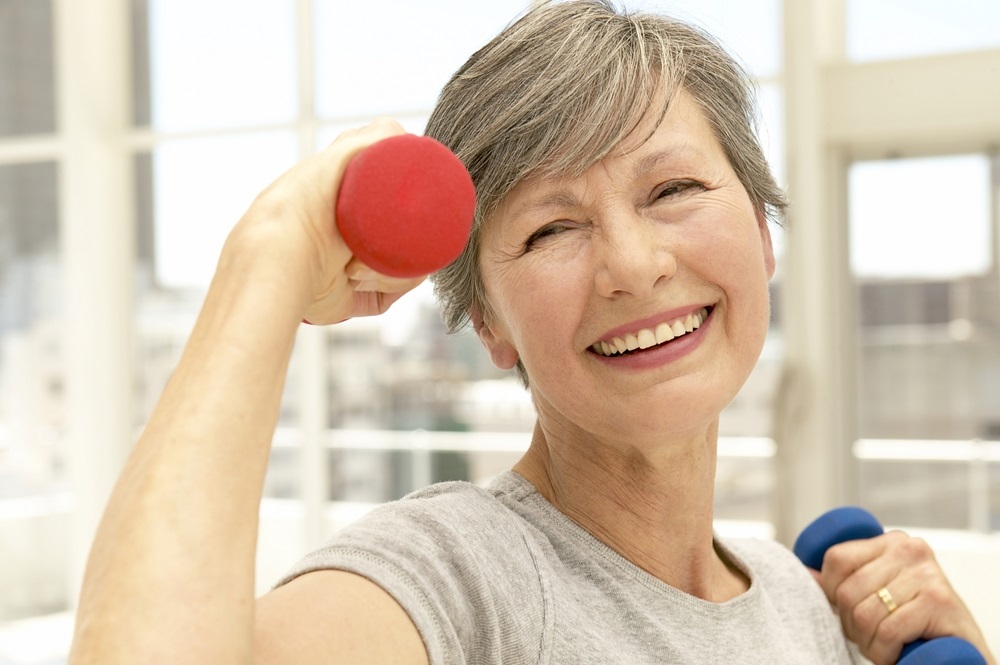senior-woman-with-hand-weights