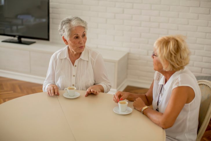 two older women talking
